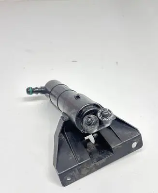 Volkswagen Touran I Headlight washer spray nozzle 1T0955978A 8WT00945300