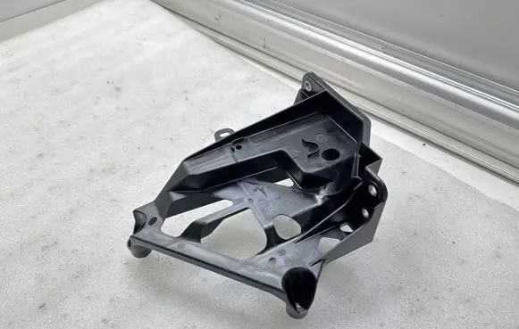 Tesla Model X Pneumatic air compressor holding bracket 102791800F 120977
