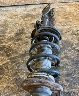 Front shock absorber with coil spring