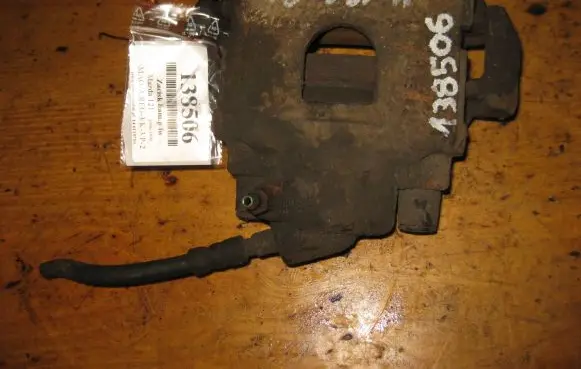 Mazda 121 SM Front brake caliper