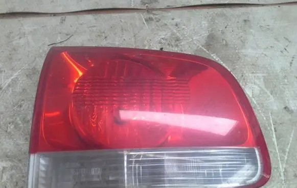 Volkswagen Touareg I Tailgate rear/tail lights 7L6945093H