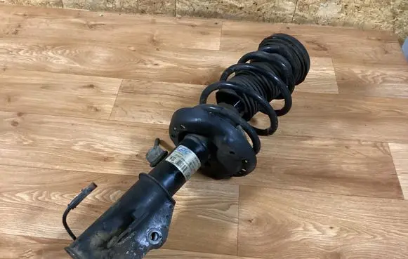 Opel Insignia A Front shock absorber with coil spring 13319741 562400005 315000331