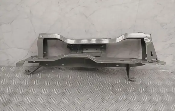 Top upper radiator support slam panel