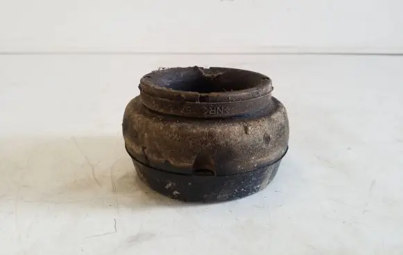 Volkswagen Polo V 6R Front coil spring rubber mount 1J0412331C