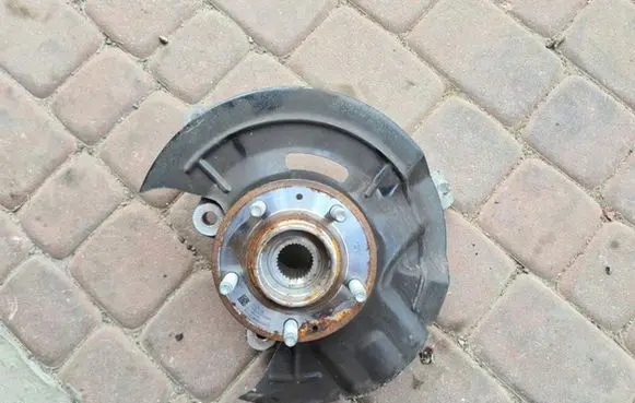 Front wheel hub spindle knuckle