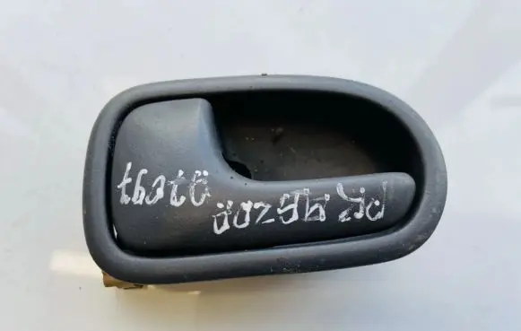 Mazda 323 Front door interior handle