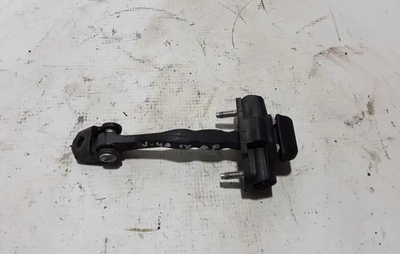Front door check strap stopper
