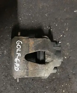 Volkswagen Golf VI Front brake caliper