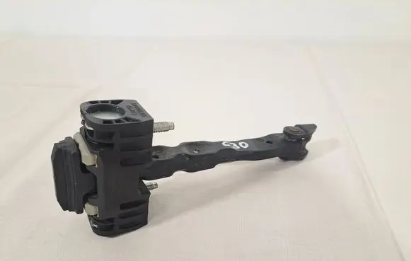 Front door check strap stopper