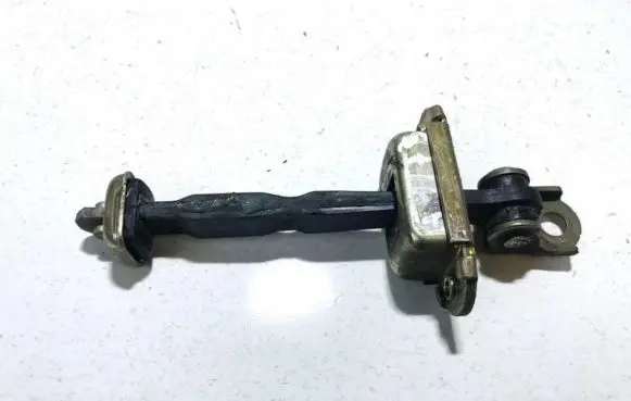 Nissan Primera Front door check strap stopper 