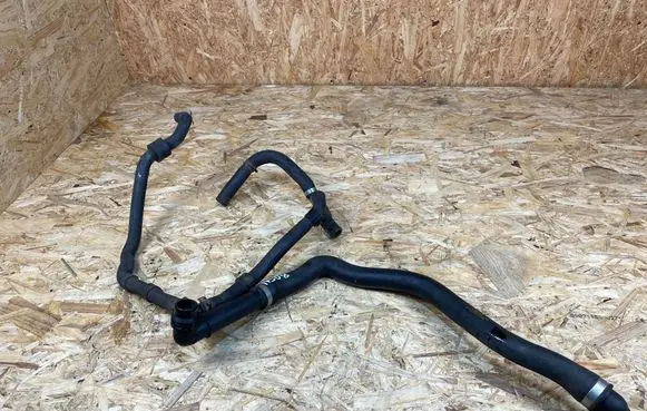 Volkswagen Golf VII Engine coolant pipe/hose 5Q0122051BK 5Q0121619D