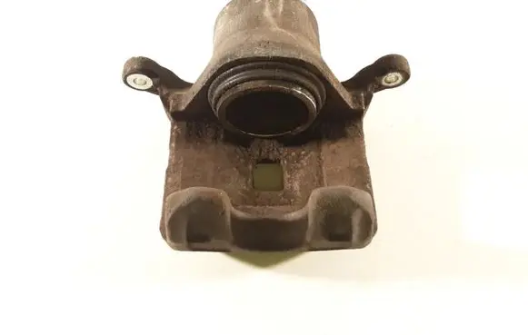 Nissan Juke I F15 Front brake caliper