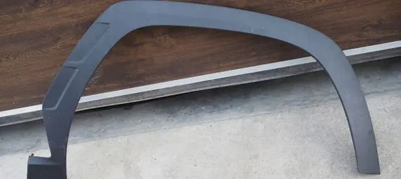 Hyundai Tucson JM Front arch trim 87712N7000