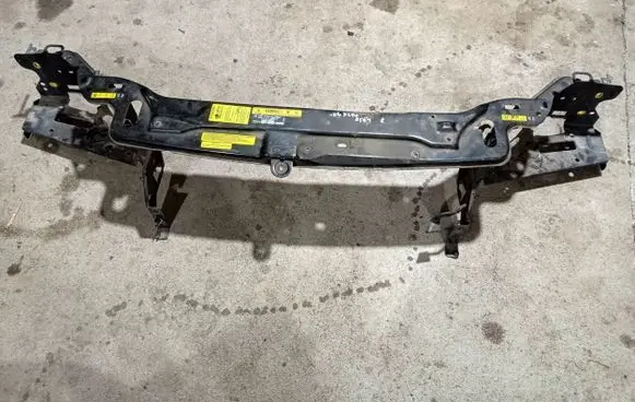 Top upper radiator support slam panel