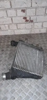 Volkswagen Touareg I Intercooler radiator 7L0145803A