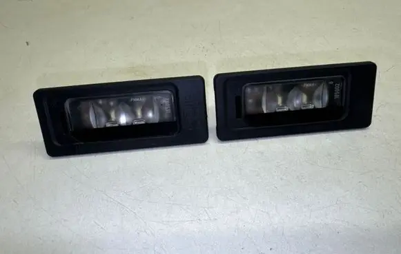 Volkswagen PASSAT B7 Number plate light 3AF943021A