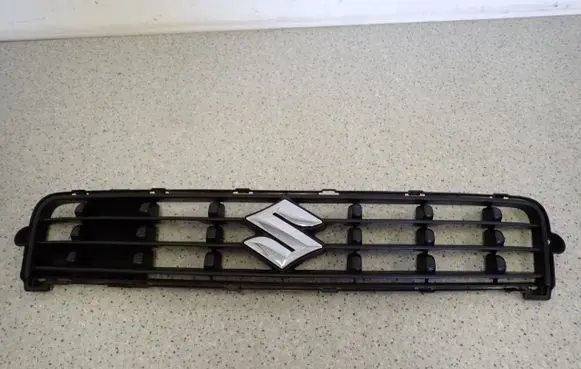 Suzuki Splash Front fog light trim/grill 