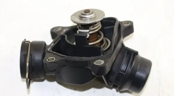 Thermostat/thermostat housing