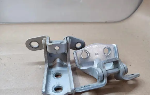 Rear door upper hinge
