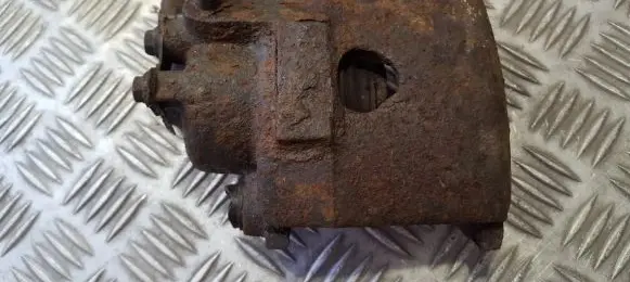 Volkswagen Golf III Front brake caliper