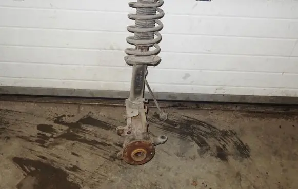 Volkswagen Caddy Front shock absorber with coil spring