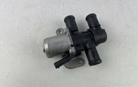 Coolant heater control valve