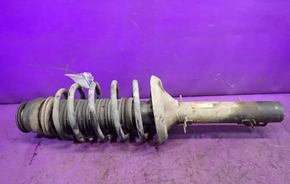 Volkswagen Golf IV Front shock absorber with coil spring 1J0413031AE