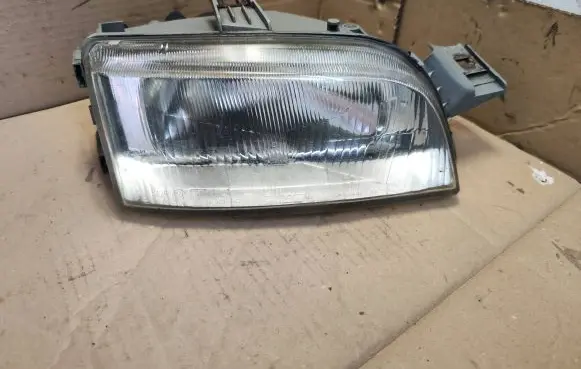 Fiat Punto (176) Headlight/headlamp R14259800 A635