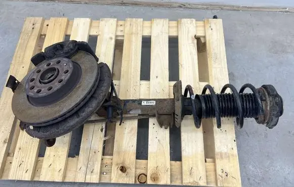 Volkswagen Golf V Front shock absorber with coil spring MMAUTKO18057