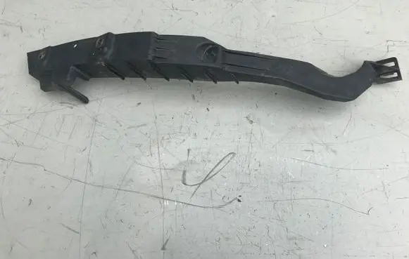 Opel Astra J Headlight/headlamp mounting bracket 13287640