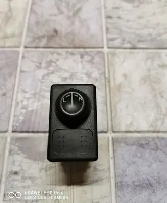 Nissan Almera Tino Wing mirror switch