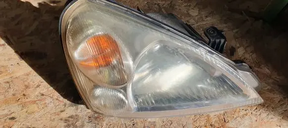 Suzuki Liana Headlight/headlamp 10032662