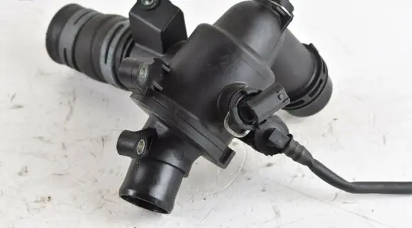 Thermostat/thermostat housing