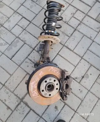 Front shock absorber with coil spring