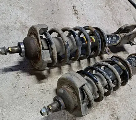Nissan Primastar Front shock absorber with coil spring 775543R