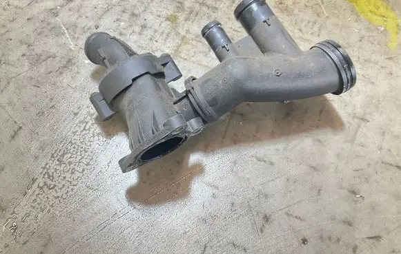 Thermostat/thermostat housing