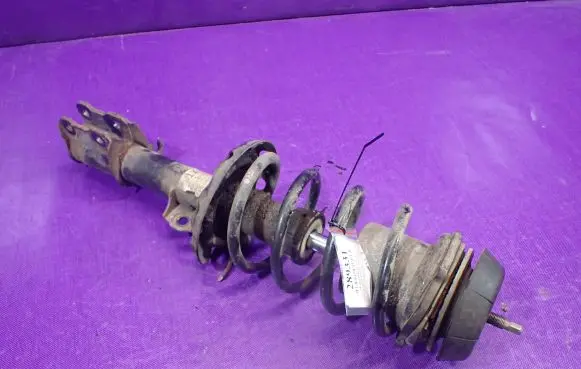 Opel Tigra B Front shock absorber with coil spring 13191019