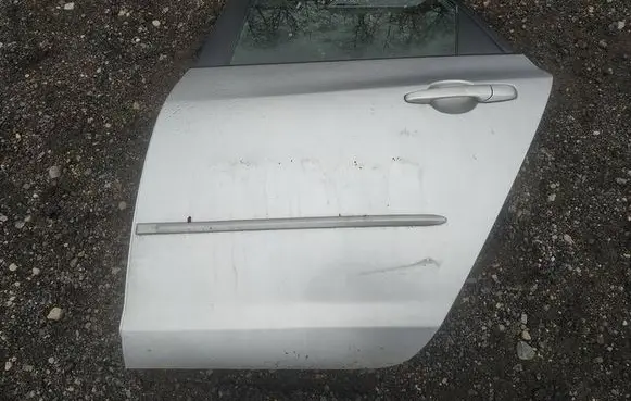 Mazda 3 I Rear door PILKOS
