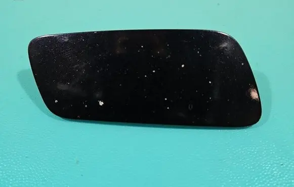 Headlight washer spray nozzle cap/cover