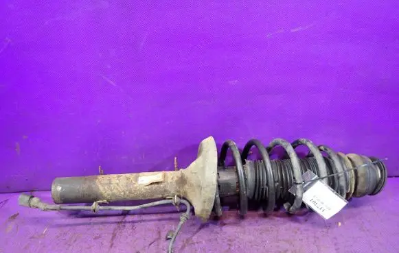 Volkswagen Golf IV Front shock absorber with coil spring 1J0413031AE