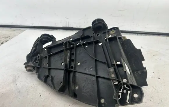 Volkswagen Touareg I Headlight/headlamp mounting bracket 16464500
