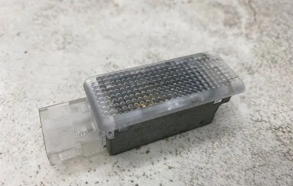Volkswagen Golf V Glove box light 6L0947565