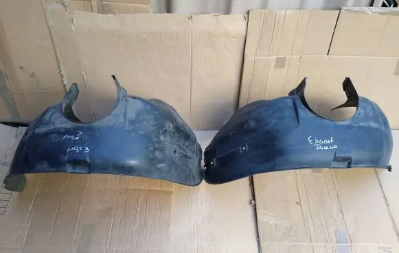 Ford Escort Front wheel arch liner splash guards 95AGA16115AD