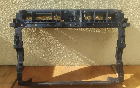 Radiator support slam panel