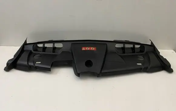 Engine bonnet/hood lock trim molding