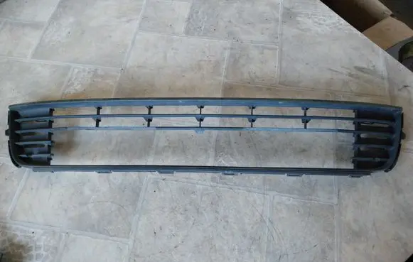 Volkswagen Caddy Front bumper lower grill 1T0853677C