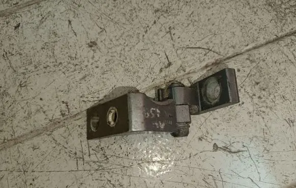 Rear door upper hinge