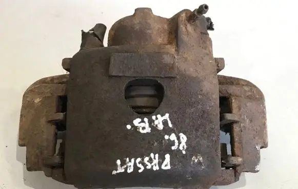 Volkswagen PASSAT B2 Front brake caliper