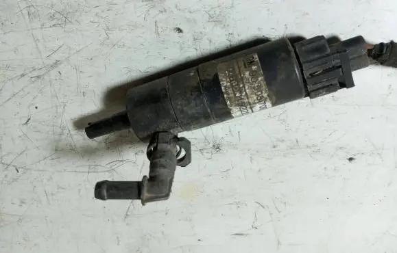 Opel Zafira B Headlight washer pump 90508709