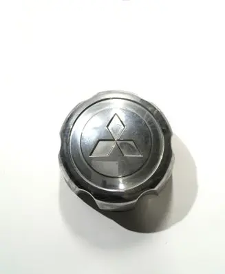 Mitsubishi Pajero Sport I Original wheel cap MB816581